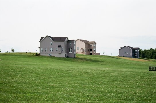 Brand new houses on green grass