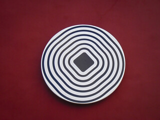 Eine Rund Scheibe mit optischer Täuschung

