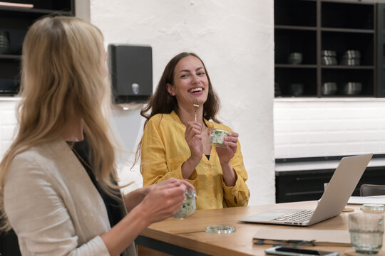 Two Women Having A Lunch Break