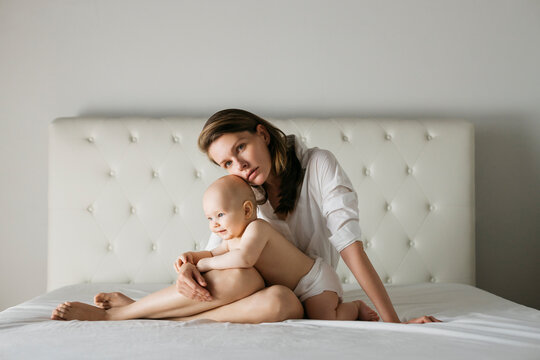 Gentle mother and a baby