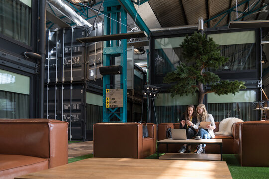 Two Entrepreneur Women Working Indoors