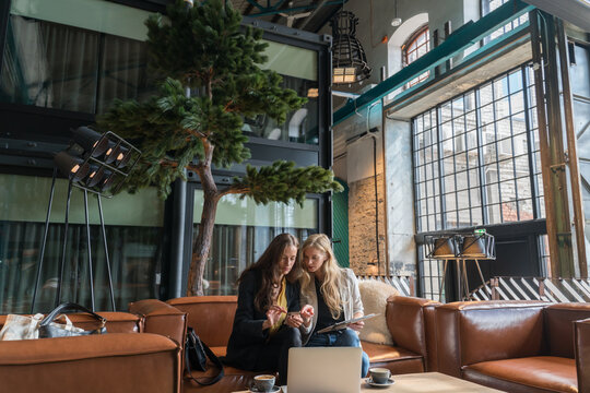 Two Women Working In The Lobby