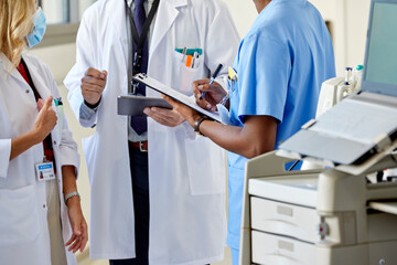 Male nurse and two doctors