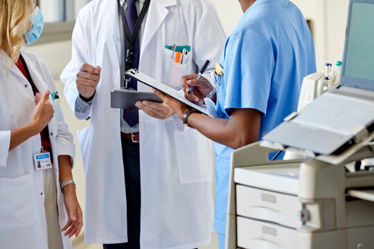 Male nurse and two doctors
