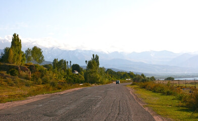 Beautiful mountains in Kyrgyzstan. Landscape with mountains at Kyrgyzstan on sunny day. Road in the Tien Shan mountain gorge