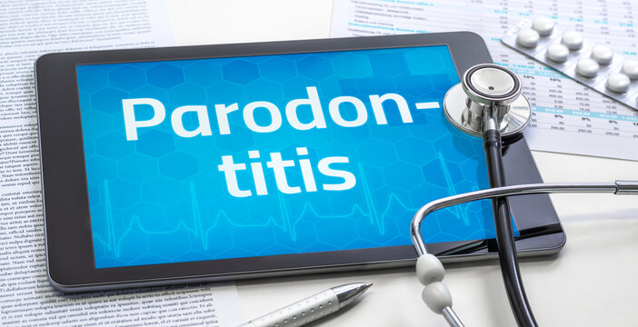 Ein Tablet mit dem Text Parodontitis auf dem Display