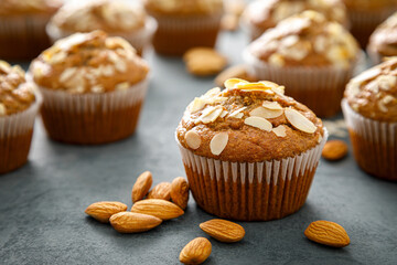 Healthy gluten free almond muffins with nut slices - Powered by Adobe