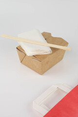 Food delivery service concept. Asian food in eco paper take away boxes. Healthy meal diet plan for daily ready menu.