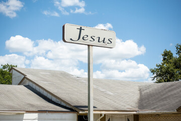 A tall jesus sign
