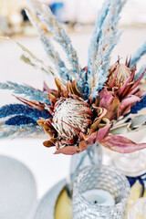 Dry Protea flower bunch. Blooming Pink King Protea Plant. Exotic flowers. Giant protea. Close up photo. Dry flowers. 
