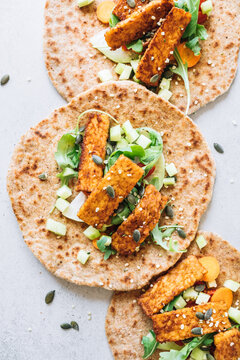 Homemade tacos with spicy tempeh and veggies
