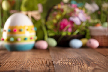 Fototapeta na wymiar Easter theme. Easter eggs. Colorful tulips. Easter baskets. Rustic wooden table. 