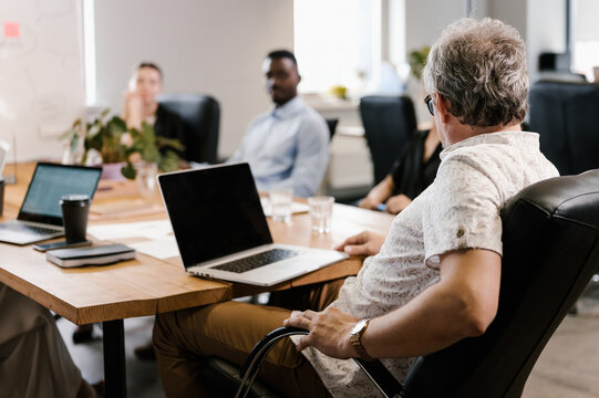 Mature employee during business meeting