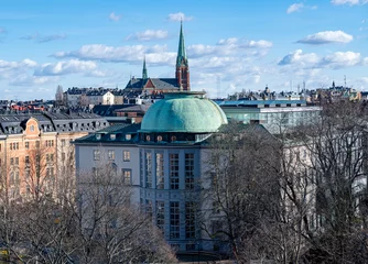 Poster de jardin Stockholm Stockholm, March 8 2021: Stockholm School of Economics and St. John's Church (Johanneskyrkan)