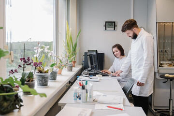 Scientists Working With Documents