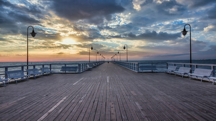 Wooden pier at sunrise
