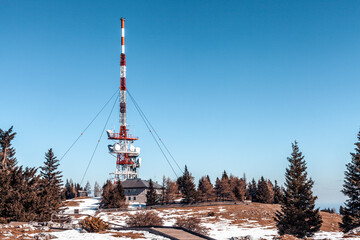 transmitter with satellites and antennas on top of the hill