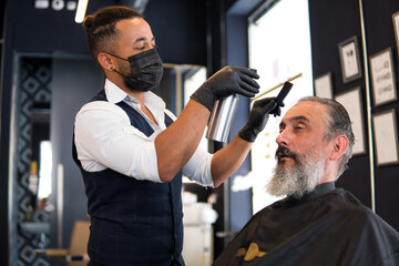 Old man at hairdresser