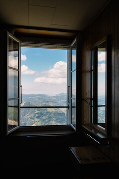 Mountain Panorama Through Open Window