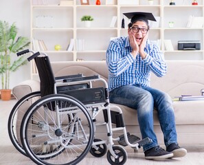 Young student on wheelchair in disability concept