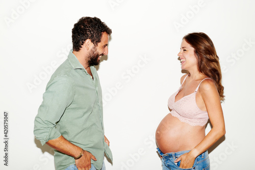 Pregnant couple in studio