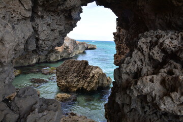 Fototapeta na wymiar Sea between the rocks in Sicily