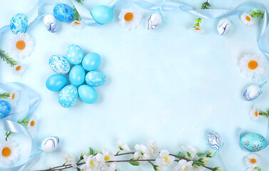 Decorated blue Easter eggs on a blue background. Minimal holiday concept. Happy easter background....