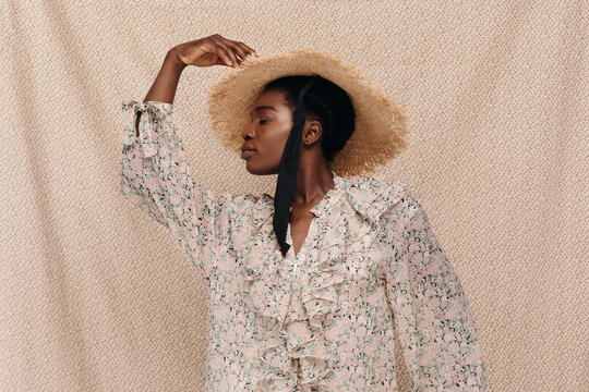 Black woman in straw hat