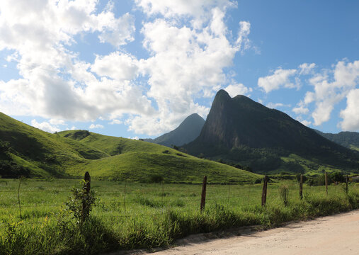 view of mountains and countryside in Bicuda Grande, Maca&eacute;, mountain region of Rio de Janeiro, Brazil. Sunny day with few clouds