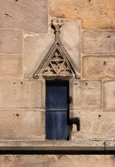 Foto op Aluminium Small gothic window with triangular wimperg gable at Schlosskirche church in the old town of Bad Dürkheim in Germany © float