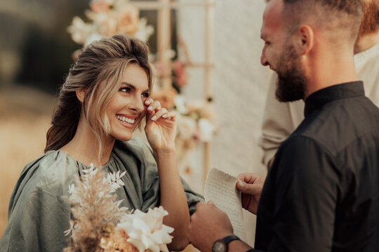 The Bride Wipes Away Her Tears Of Emotion