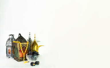 Background image with white background with arabic lantern, dates and beads. Ramadhan and Eid concept