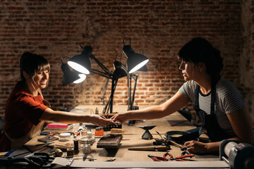 Coworkers in Artisan Workshop