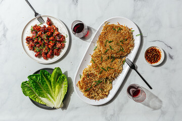 Dinner setting with asian themed recipes