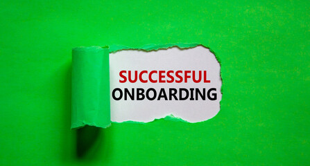 Successful onboarding symbol. Words 'Successful onboarding' appearing behind torn green paper. Beautiful green background. Business, successful onboarding concept, copy space.