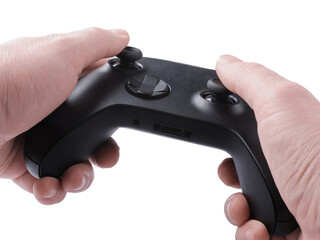 Gamepad in hands on isolated background © olegkruglyak3