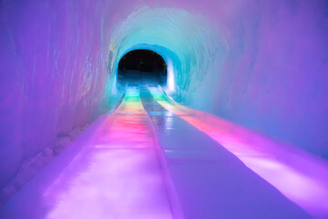 Ice slide in a tunnel with rainbow colors