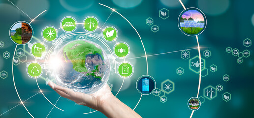 Woman holding planet Earth with recycling symbols and green planet. Elements of this image...