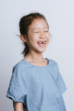 A cute laughing young girl