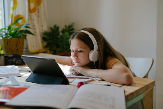 Teen Girl doing homework During Pandemic