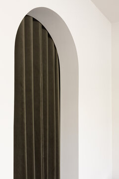 Arch doorway with curtain