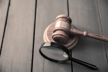 magnifier with judge gavel