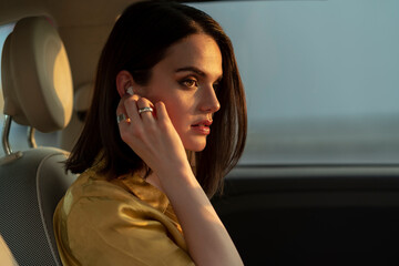 Woman driving with hands free