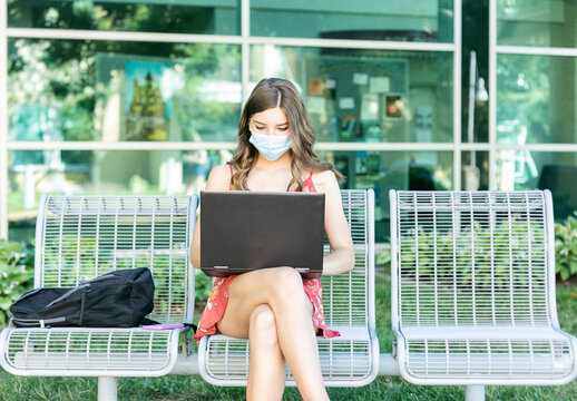 Covid: College Student Takes Remote Class On Laptop