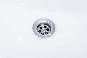 clean sink drain close up. background for plumber service