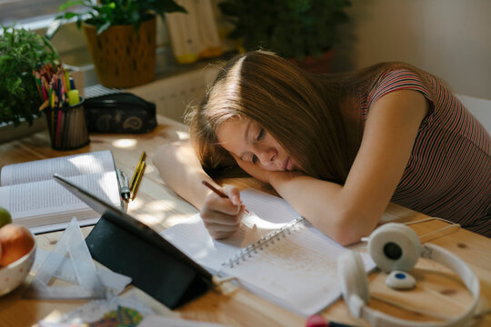 Teen girl doing homework