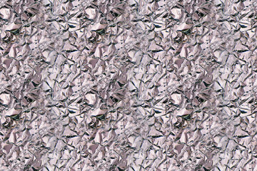 Seamless texture of wrinkled metal foil, silver color, abstract background.
