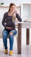 Pregnant woman at home getting ready for childbirth