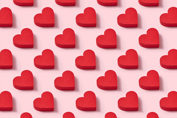 Papercraft red hearts pattern with shadows.