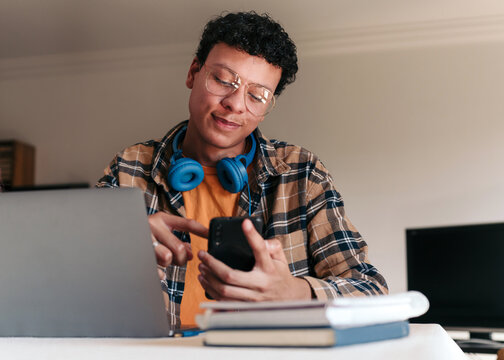 Teenager studying at home